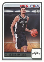 Victor Wembanyama 2023 2024 Hoops Basketball Series Mint Rookie Card #277 Picturing this San Antonio Spurs Global Sensation in his Black Jersey