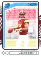 Jayden Daniels 2024 Panini Donruss Series Mint Rated Rookie Card #389 Picturing this Washington Commanders Star QB in his Red Jersey