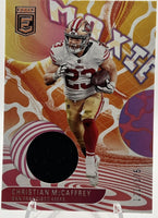 Christian McCaffrey 2023 Panini Donruss Elite Moxie Series Mint Insert Card #26 Featuring an Authentic Black Jersey Swatch #121/375