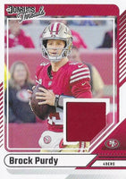 Brock Purdy 2024 Panini Donruss Threads Series Mint Insert Card #DTH-BPU Featuring an Authentic Red Jersey Swatch