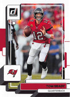 Tom Brady 2022 Panini Donruss Series Mint Card #255 picturing him in his Red Tampa Bay Buccaneers Jersey.
