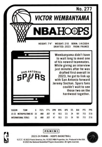 Victor Wembanyama 2023 2024 Hoops Basketball Series Mint Rookie Card #277 Picturing this San Antonio Spurs Global Sensation in his Black Jersey