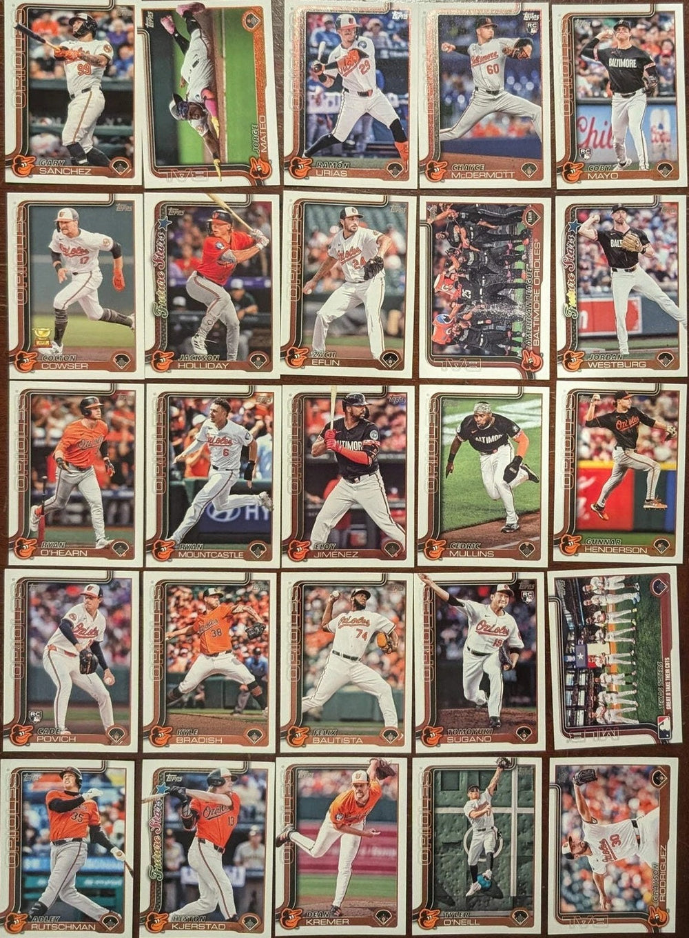 Baltimore Orioles 2025 Topps Complete Mint 24 Card Team Set Featuring Adley Rutschman and Gunnar Henderson with Rookie Cards of Coby Mayo, Cade Povich, Chayce McDermott and Tomoyuki Sugano Plus