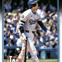 Shohei Ohtani 2024 Topps Update Baseball Series Mint Card #US123 Japanese Born HR Record Ohtani Stands Alone picturing him in his new White Los Angeles Dodgers Jersey