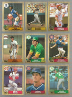 1987 Topps and 1987 Topps Traded Complete Mint Sets in Album.
