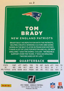 Tom Brady 2021 Panini Donruss Series Mint Card #2 picturing him in his White New England Patriots Jersey