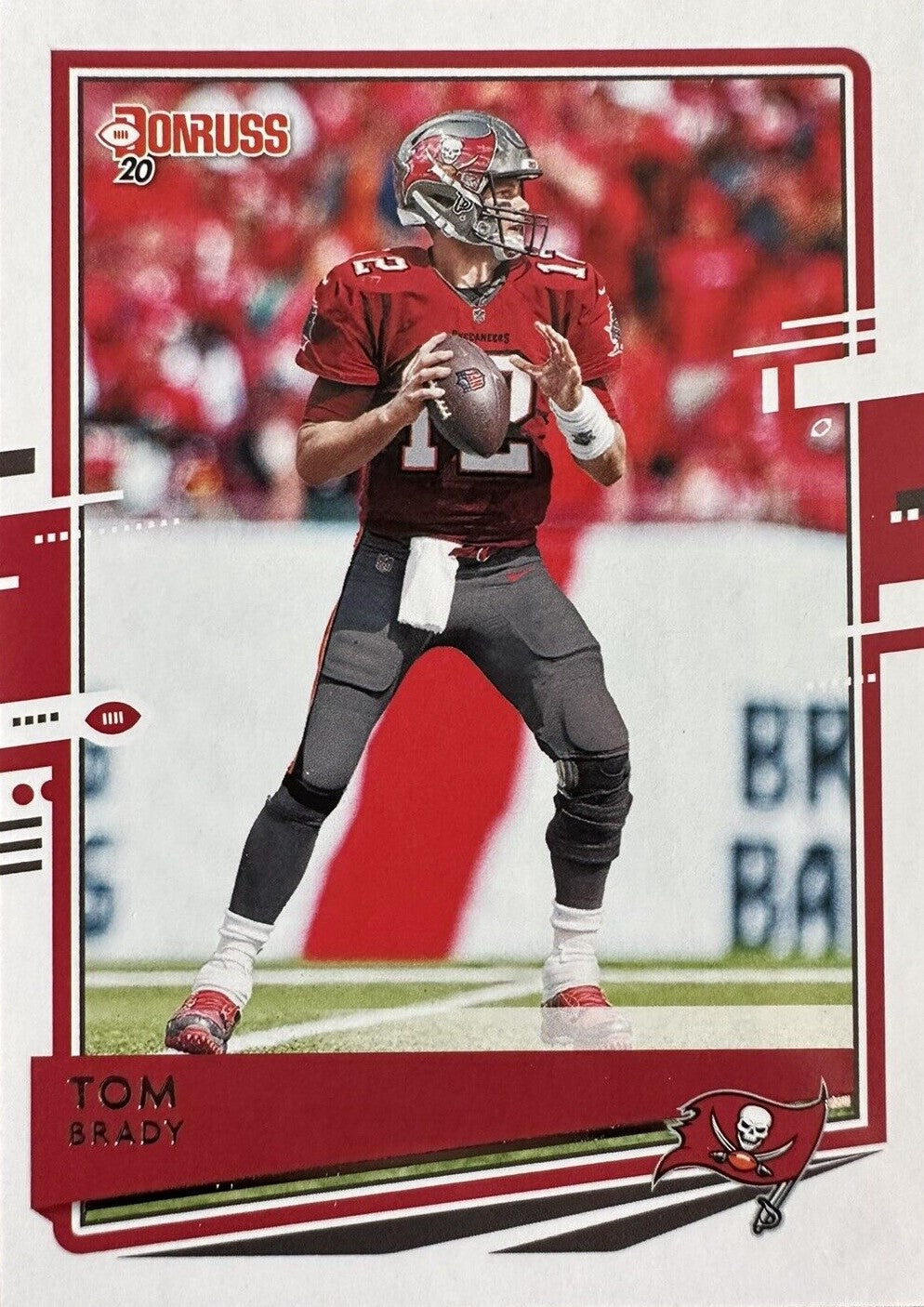 Tom Brady 2020 Panini Donruss Series Mint Card #230 picturing him in his Tampa Bay Buccaneers Jersey.
